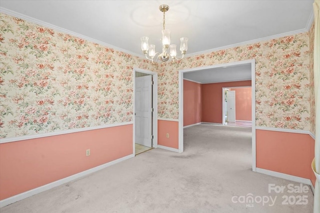 8017 Prince George Rd, Charlotte, NC 28210 - carpeted spare room featuring a chandelier, wallpapered walls, ornamental molding, and baseboards