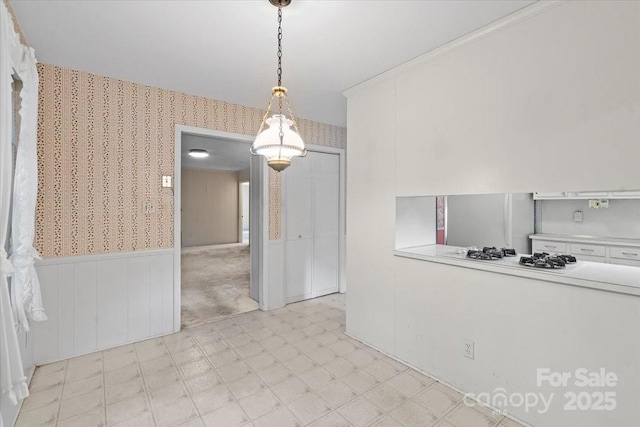 8017 Prince George Rd, Charlotte, NC 28210 - unfurnished dining area with wallpapered walls and light flooring