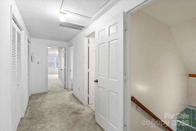 8017 Prince George Rd, Charlotte, NC 28210 - corridor featuring light colored carpet, an upstairs landing, and baseboards