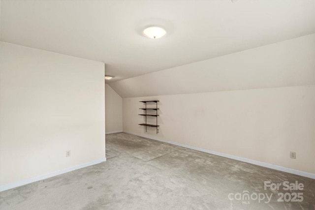 8017 Prince George Rd, Charlotte, NC 28210 - additional living space featuring lofted ceiling, carpet floors, and baseboards