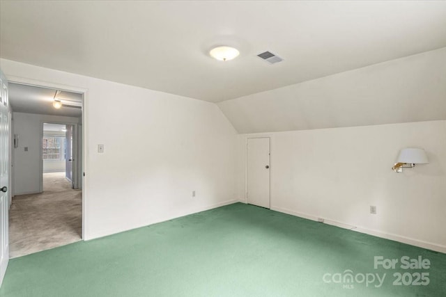 8017 Prince George Rd, Charlotte, NC 28210 - additional living space with carpet floors and vaulted ceiling