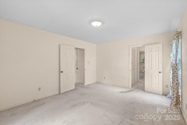 8017 Prince George Rd, Charlotte, NC 28210 - unfurnished bedroom featuring carpet floors and baseboards