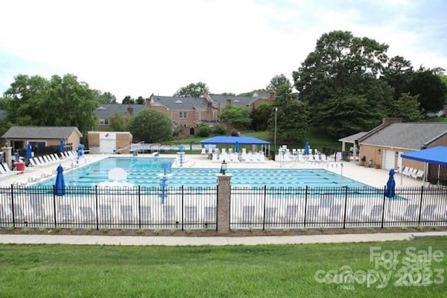 8017 Prince George Rd, Charlotte, NC 28210 - community pool with a patio and a residential view
