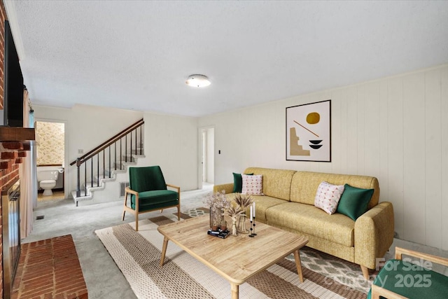 8017 Prince George Rd, Charlotte, NC 28210 - living area featuring stairs, a fireplace, and carpet