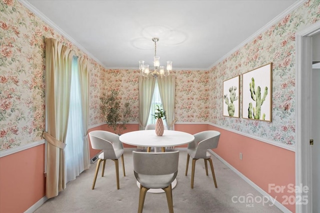 8017 Prince George Rd, Charlotte, NC 28210 - dining area with a chandelier, wallpapered walls, ornamental molding, wainscoting, and light colored carpet