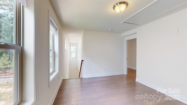 14506 Knowledge Cir, Charlotte, NC 28277 - unfurnished room featuring attic access, wood finished floors, and baseboards