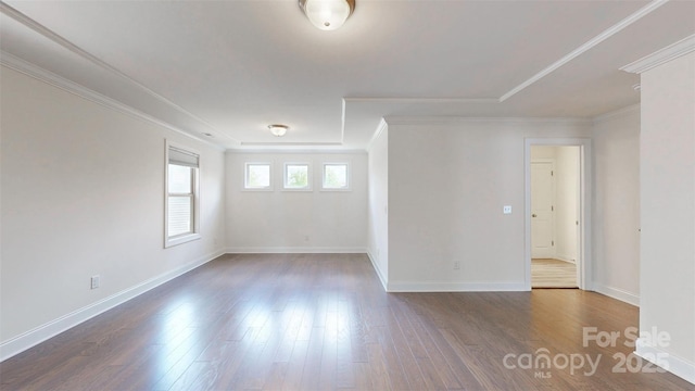 14506 Knowledge Cir, Charlotte, NC 28277 - spare room with baseboards, dark wood finished floors, and crown molding