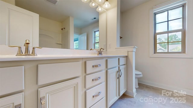 14506 Knowledge Cir, Charlotte, NC 28277 - full bathroom featuring toilet, baseboards, double vanity, a shower, and tile patterned flooring