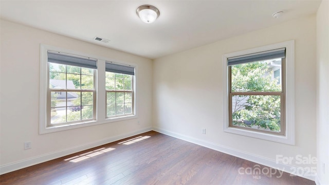 14506 Knowledge Cir, Charlotte, NC 28277 - unfurnished room with dark wood-type flooring and baseboards