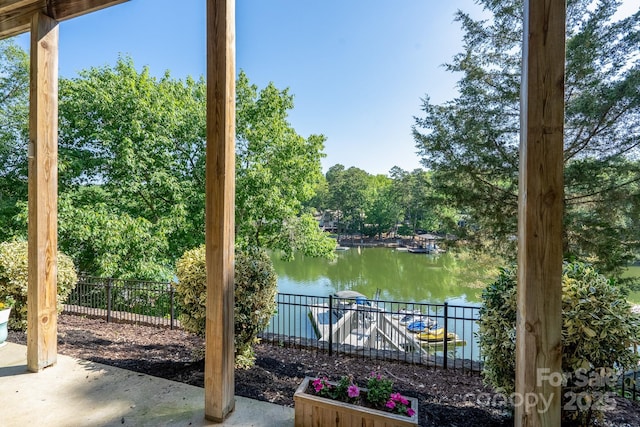 126 Strand Rd, New London, NC 28127 - water view with fence and a tree filled landscape