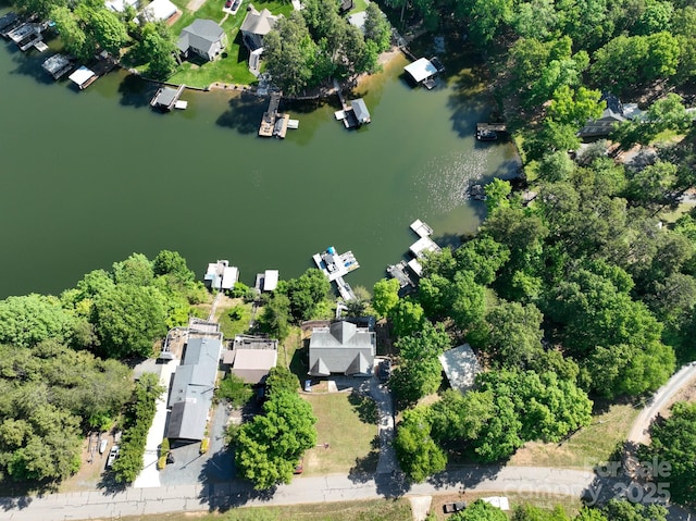 126 Strand Rd, New London, NC 28127 - aerial view of property and surrounding area featuring a large body of water and nearby suburban area