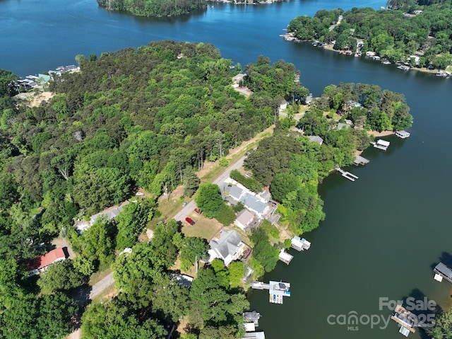 126 Strand Rd, New London, NC 28127 - aerial view of property and surrounding area featuring a nearby body of water and a heavily wooded area
