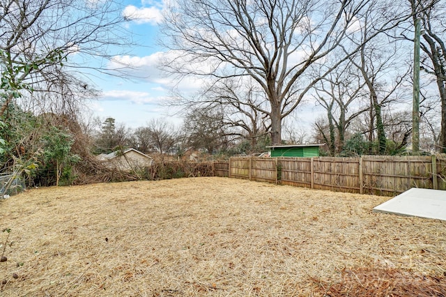 view of yard with a fenced backyard