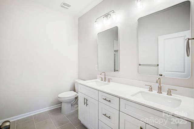 full bath with a sink, toilet, baseboards, and visible vents