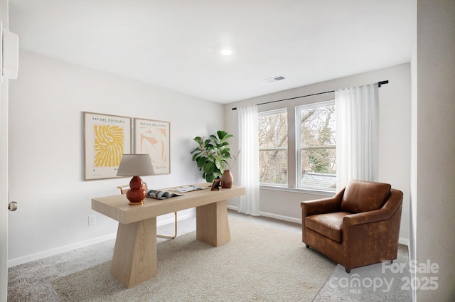 office space featuring light colored carpet, visible vents, baseboards, and recessed lighting