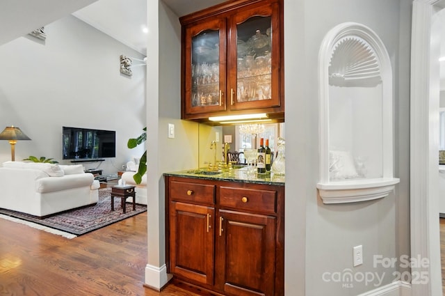 5718 Bardsey Ct, Matthews, NC 28104 - indoor wet bar featuring wood finished floors