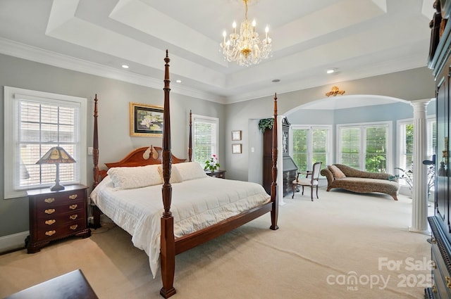 5718 Bardsey Ct, Matthews, NC 28104 - bedroom featuring light carpet, arched walkways, a chandelier, decorative columns, and recessed lighting