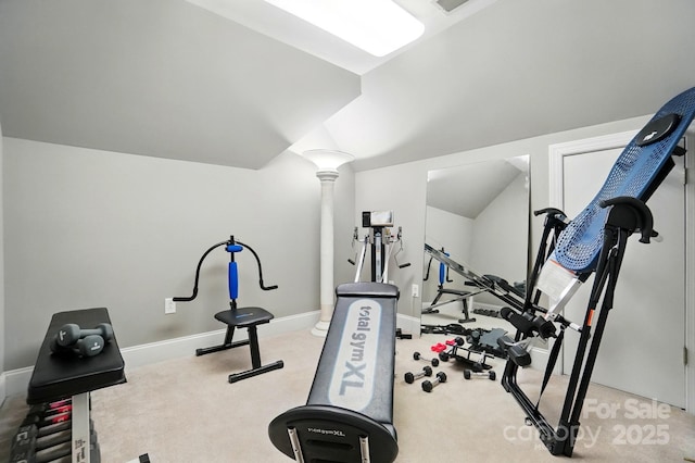 5718 Bardsey Ct, Matthews, NC 28104 - exercise area with carpet flooring, baseboards, lofted ceiling, and decorative columns