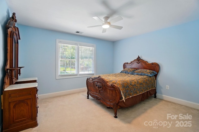 5718 Bardsey Ct, Matthews, NC 28104 - bedroom with light carpet, baseboards, and a ceiling fan