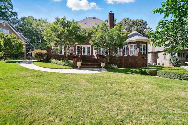5718 Bardsey Ct, Matthews, NC 28104 - view of front of home with french doors, brick siding, a front lawn, and stairs