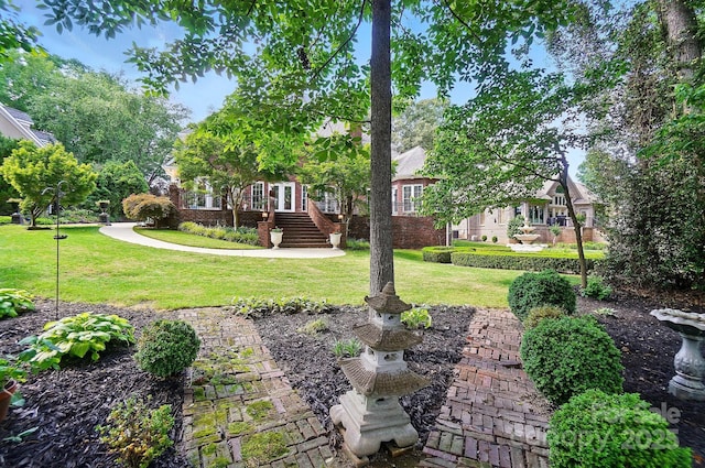 5718 Bardsey Ct, Matthews, NC 28104 - view of green lawn featuring french doors and stairs