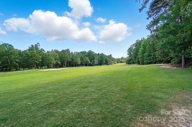 5718 Bardsey Ct, Matthews, NC 28104 - view of grassy yard featuring golf course view and view of scattered trees