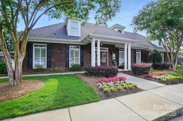 5718 Bardsey Ct, Matthews, NC 28104 - view of front of property featuring brick siding, roof with shingles, and a front lawn