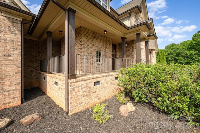 1010 Nutall Oak Ln, Belmont, NC 28012 - view of property exterior with a porch and brick siding