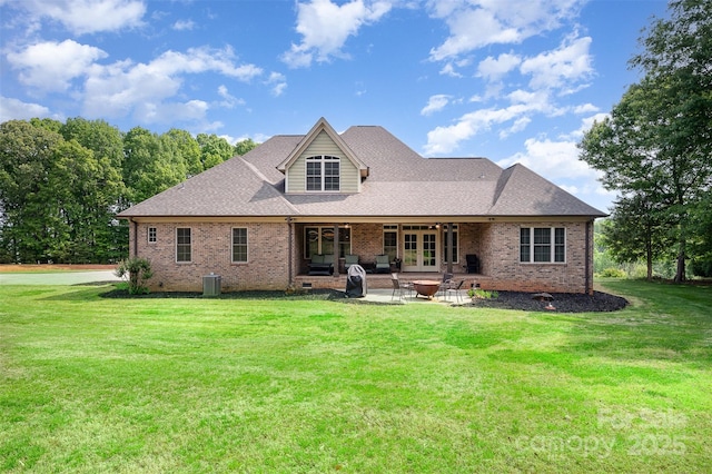 1010 Nutall Oak Ln, Belmont, NC 28012 - rear view of house featuring a yard, brick siding, cooling unit, a patio area, and roof with shingles