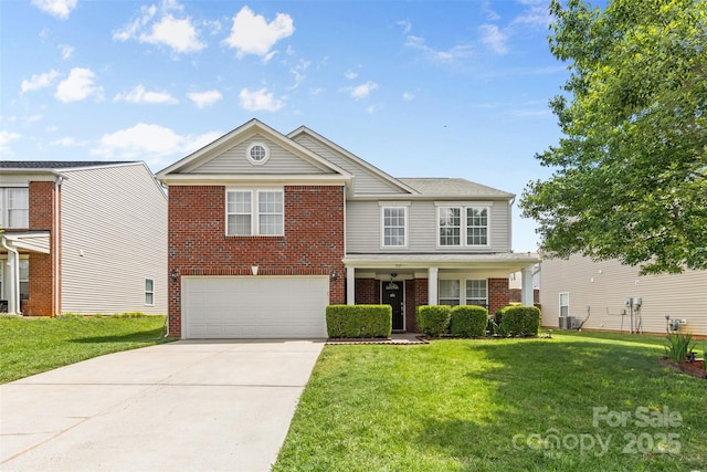 traditional-style house with an attached garage, brick siding, driveway, and a front lawn