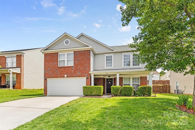 traditional-style house featuring a garage, brick siding, driveway, and central air condition unit