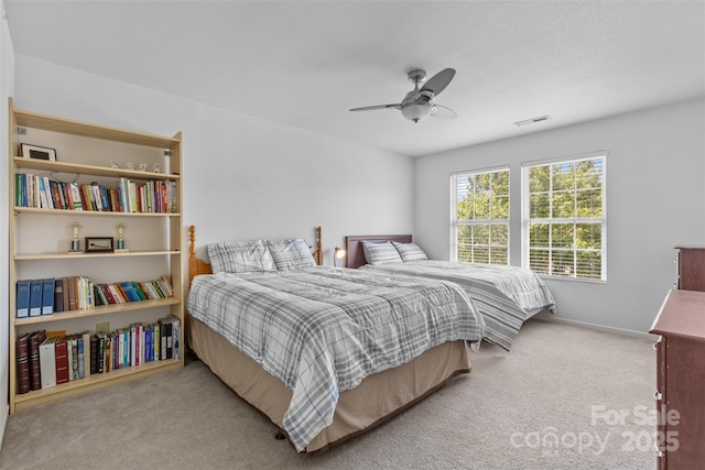 bedroom featuring carpet and a ceiling fan