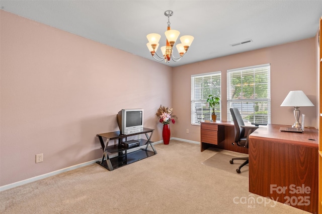 office area featuring light colored carpet, a chandelier, and baseboards
