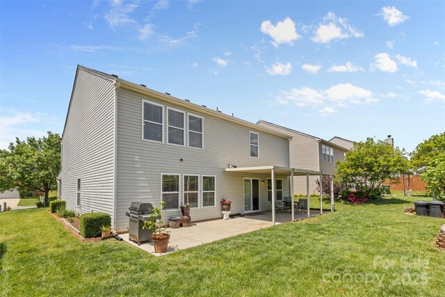 back of property with a patio area