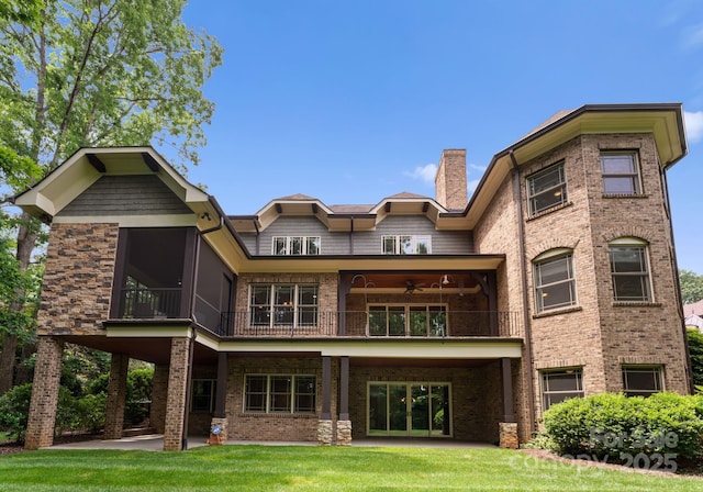 3815 Stoney Ridge Trl, Charlotte, NC 28210 - back of property featuring a balcony, a patio area, a chimney, and a yard