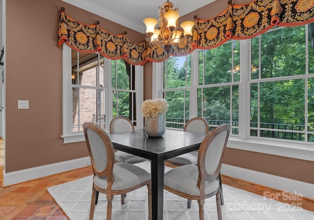 3815 Stoney Ridge Trl, Charlotte, NC 28210 - dining room featuring baseboards, crown molding, and a chandelier