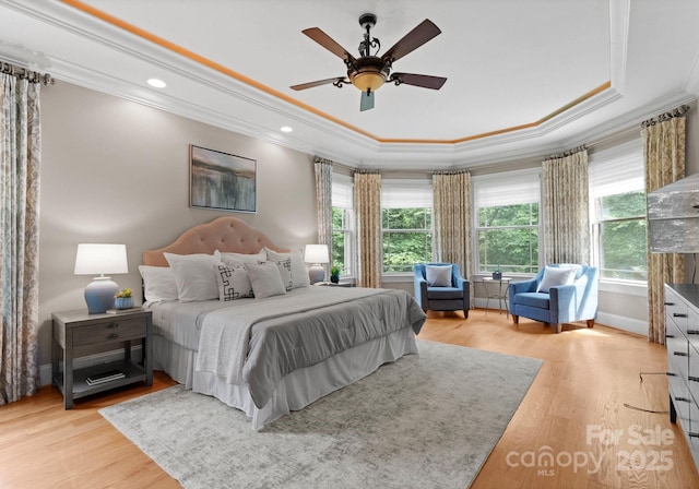3815 Stoney Ridge Trl, Charlotte, NC 28210 - bedroom with a tray ceiling, ornamental molding, light wood finished floors, recessed lighting, and ceiling fan