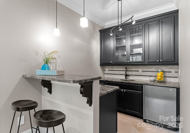 3815 Stoney Ridge Trl, Charlotte, NC 28210 - indoor wet bar with stainless steel refrigerator, backsplash, ornamental molding, pendant lighting, and light tile patterned floors