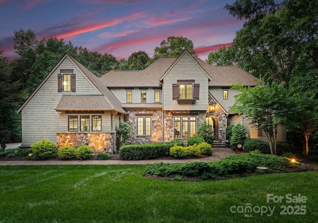 12835 Ninebark Trl, Charlotte, NC 28278 - view of front of home featuring stone siding, a front lawn, and roof with shingles