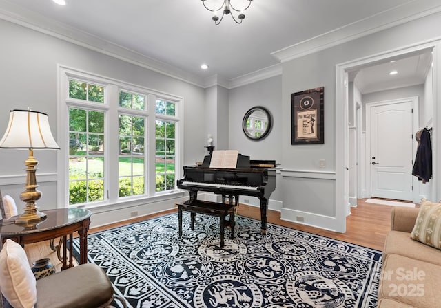 12835 Ninebark Trl, Charlotte, NC 28278 - home office featuring light wood-type flooring, healthy amount of natural light, crown molding, recessed lighting, and baseboards