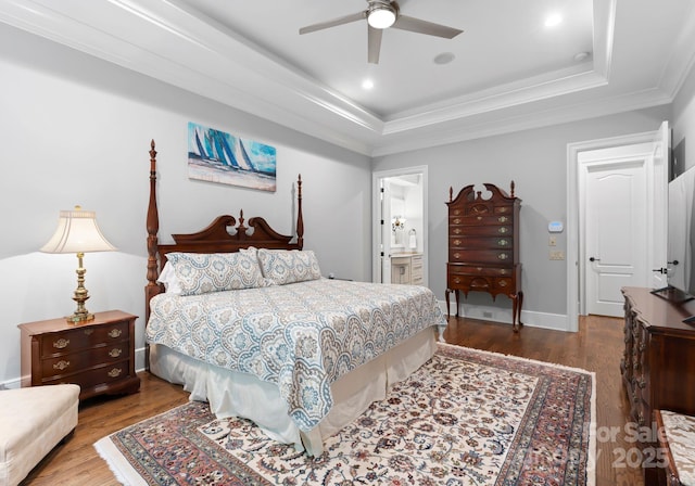 12835 Ninebark Trl, Charlotte, NC 28278 - bedroom with a tray ceiling, wood finished floors, ornamental molding, ensuite bathroom, and recessed lighting