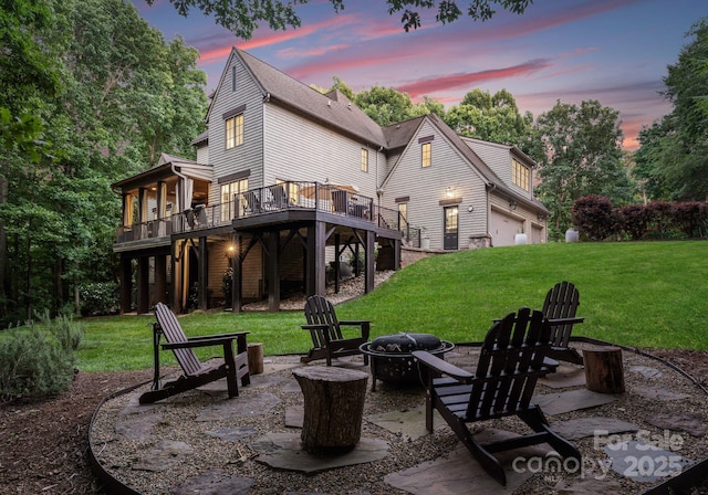 12835 Ninebark Trl, Charlotte, NC 28278 - rear view of house featuring an outdoor fire pit, a wooden deck, a yard, and a patio area