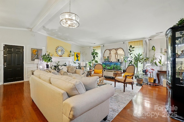 6221 Thermal Rd, Charlotte, NC 28211 - living room with a chandelier, hardwood / wood-style floors, and ornamental molding