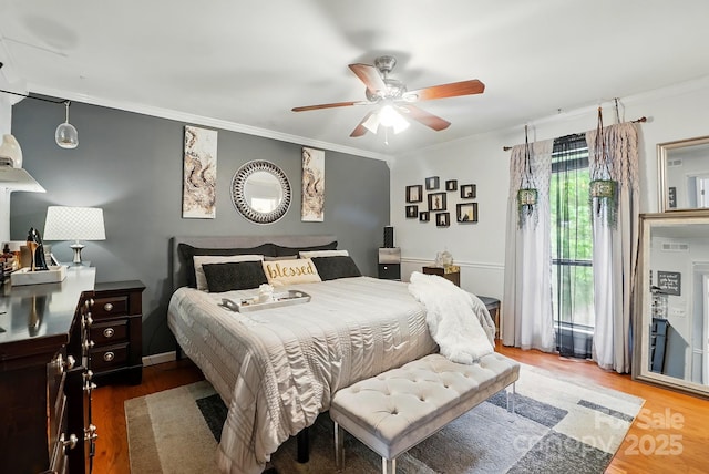 6221 Thermal Rd, Charlotte, NC 28211 - bedroom with wood finished floors, crown molding, and ceiling fan