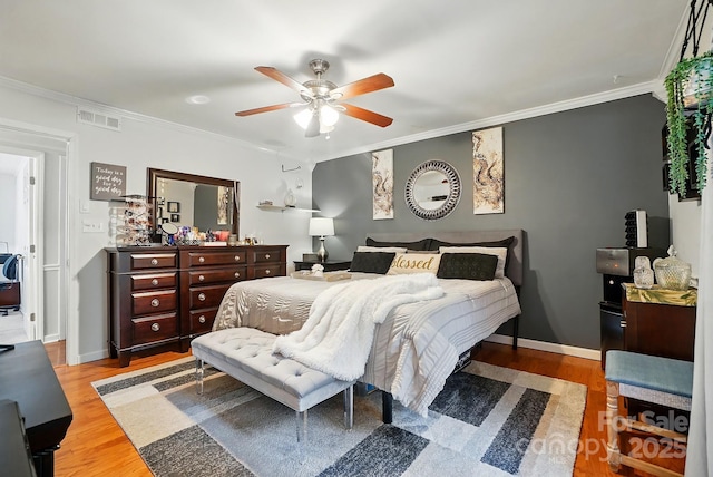 6221 Thermal Rd, Charlotte, NC 28211 - bedroom with wood finished floors, ornamental molding, ceiling fan, and baseboards
