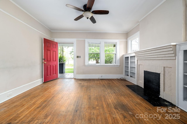 unfurnished living room featuring baseboards, a brick fireplace, ceiling fan, and hardwood / wood-style flooring