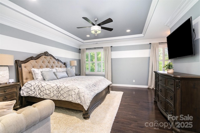 16109 Reynolds Dr, Indian Land, SC 29707 - bedroom featuring baseboards, dark wood-style flooring, a raised ceiling, recessed lighting, and ornamental molding