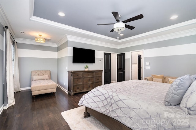 16109 Reynolds Dr, Indian Land, SC 29707 - bedroom featuring dark wood-style floors, baseboards, ornamental molding, ceiling fan, and a tray ceiling