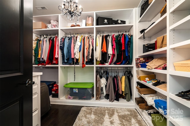 16109 Reynolds Dr, Indian Land, SC 29707 - spacious closet with wood finished floors and a chandelier