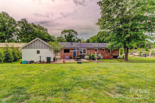 800 Sunset Rd, Cherryville, NC 28021 - back of house with a patio, a lawn, and view of wooded area